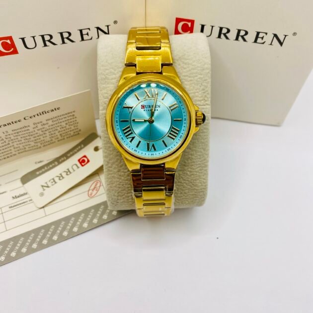 ساعة نسائية Curren 9091 براصلي ذهبي خلفية ازرق فيروزي