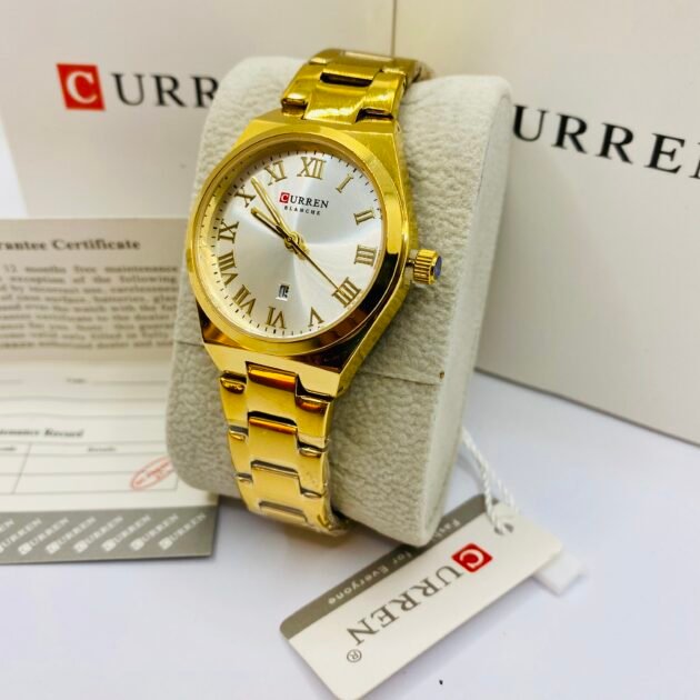 ساعةنسائية Curren 9095 براصلي ذهبي خلفية بيضاء