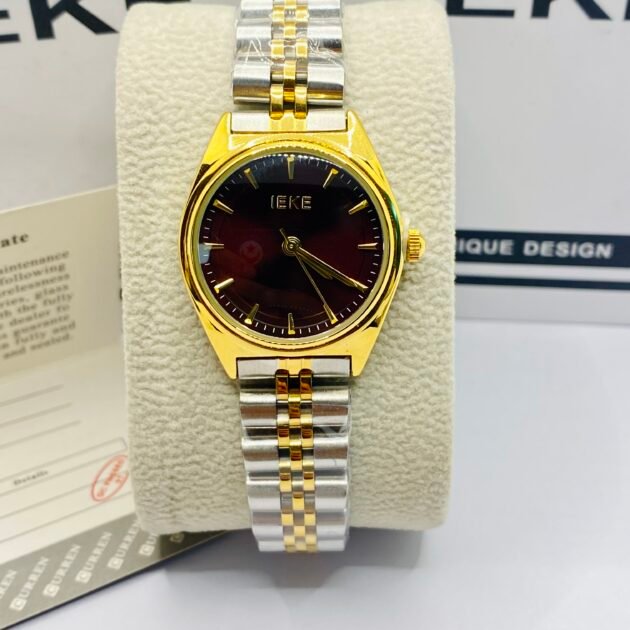 ساعة نسائية IEKE 88267 براصلي ذهبي فضي بخلفية برغندي