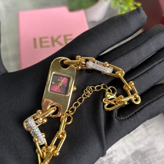 ساعة نسائية IEKE 88244 براصلي ذهبي بخلفية برغندي