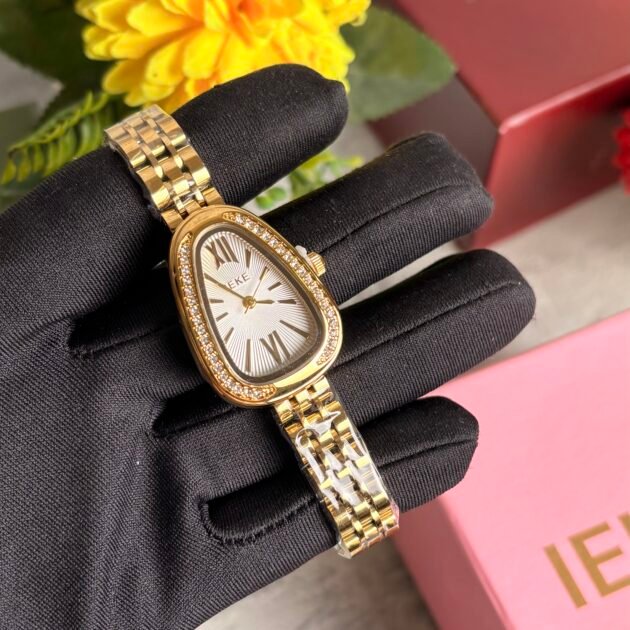ساعة نسائية IEKE 88241 براصلي ذهبي بخلفية بيضاء